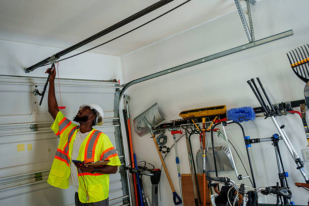 Professional Garage Door Panel Replacement technician working in West Bend, WI